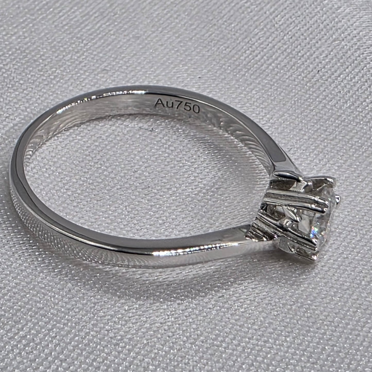 0.5 ctw round solitare, 18K size 6.75