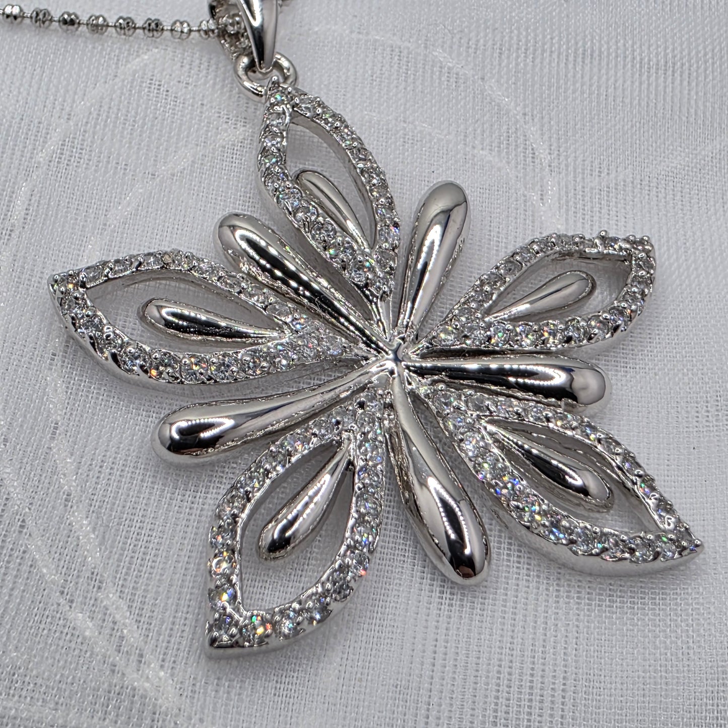 1.3 ctw Moissanite Flower, 24in chain
